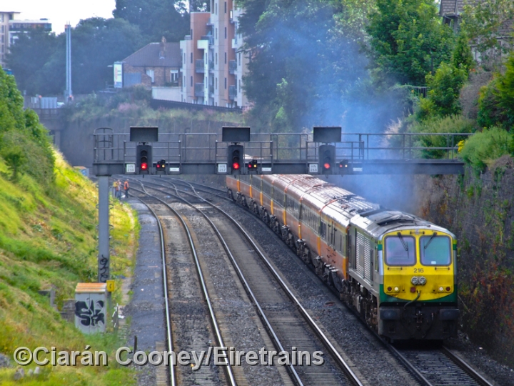 216_20090727_001_CC_JA.jpg - No.216 is seen making a spirited departure away from Dublin as it powers along the uphill gradient at Islandbridge with a rake of Mk3 coaching stock.