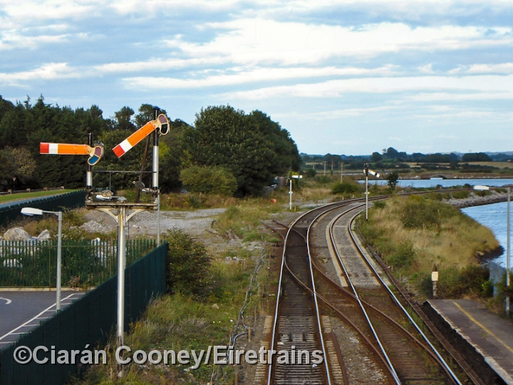 CobhJunction_20050819_004_CC_JA.jpg - Cobh Junction, where the Youghal and Cobh lines separate. At this time in August 2005 the then disused Youghal line can be seen diverging to the left, while the line to Cobh curves to the right heading south.