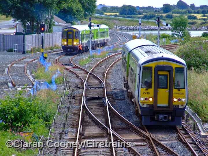 CobhJunction_20090716_016_CC_JA.jpg - Coming up to date, Cobh Junction has been refurbished with the line to Youghal reopening as far as Midleton. 2700 Class railcar No.2722 awaits the road off the Youghal line, while sister unit 2716 approaches with a service from Cobh. Today the trackwork has again been altered to allow higher speeds.